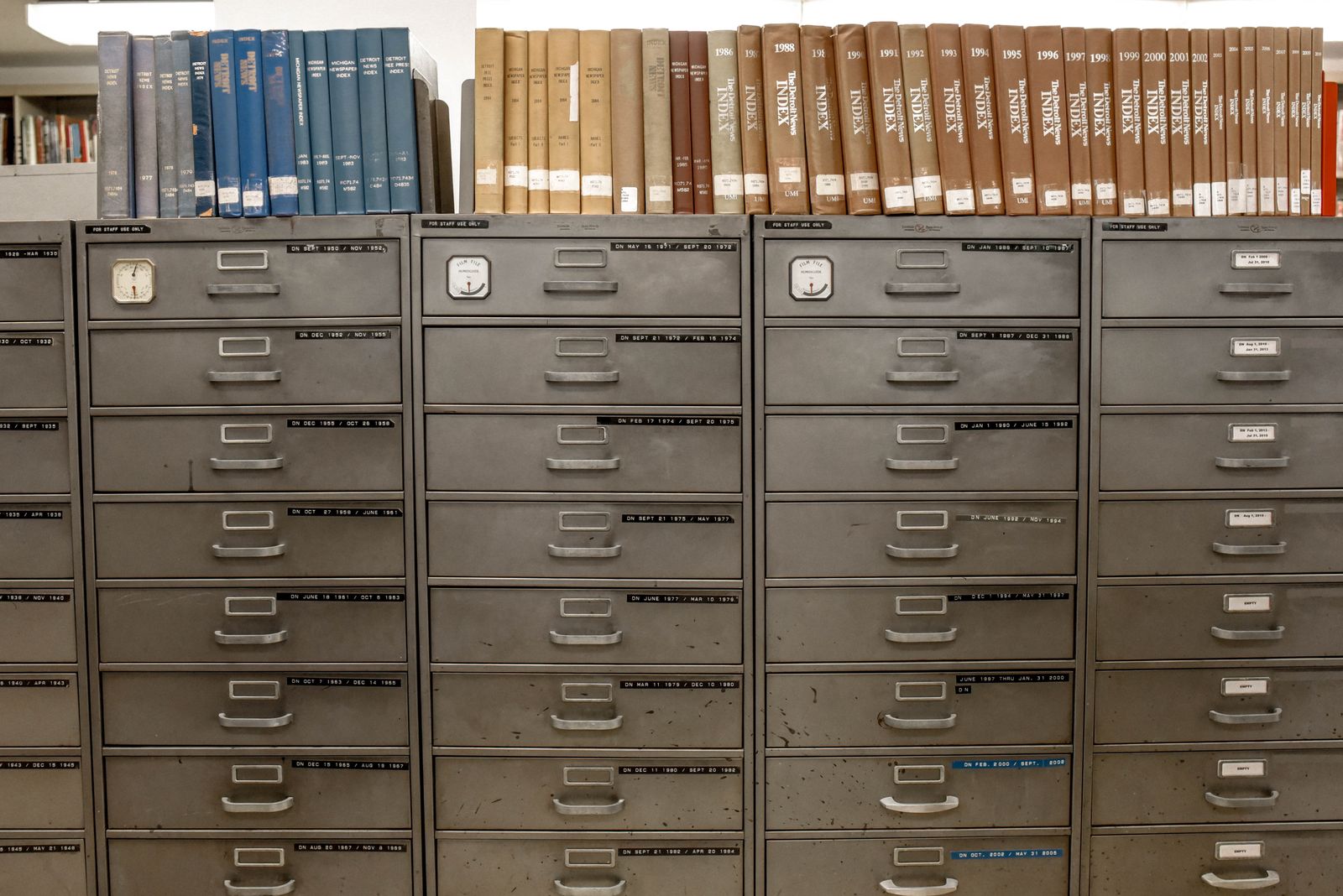 Rows of organised filing cabinets holding account records