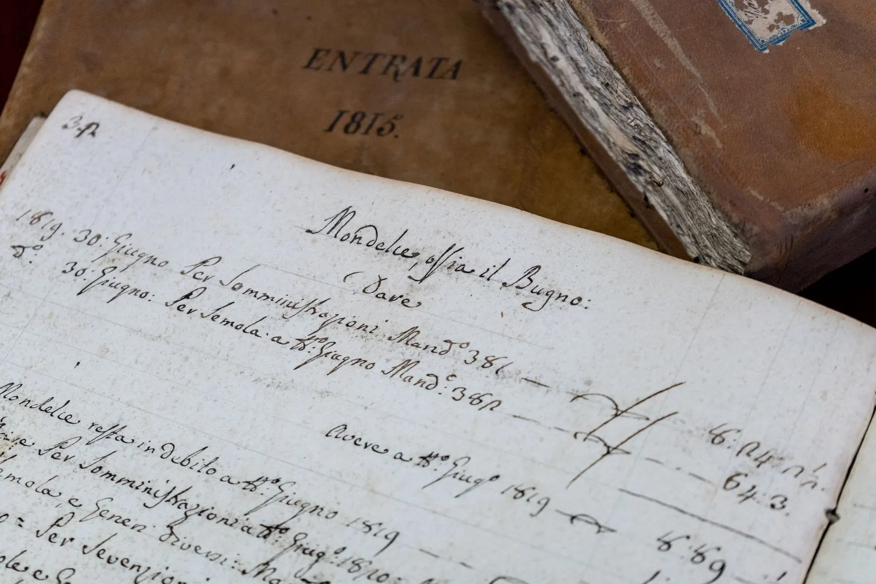 Open handwritten ledger with dated income entries