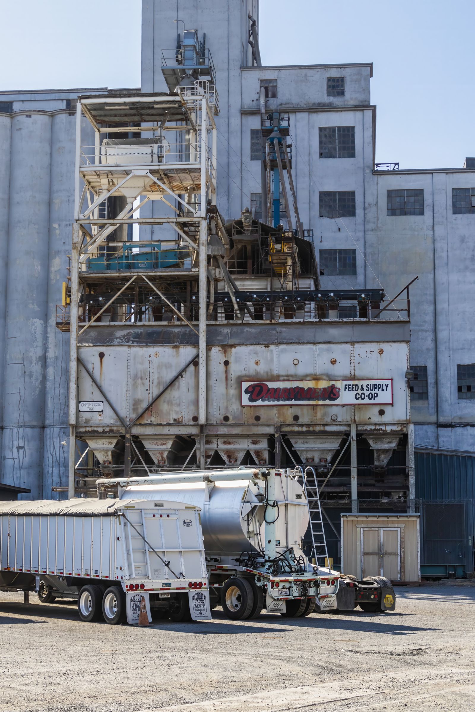 Trucks parked at a warehouse loading dock
